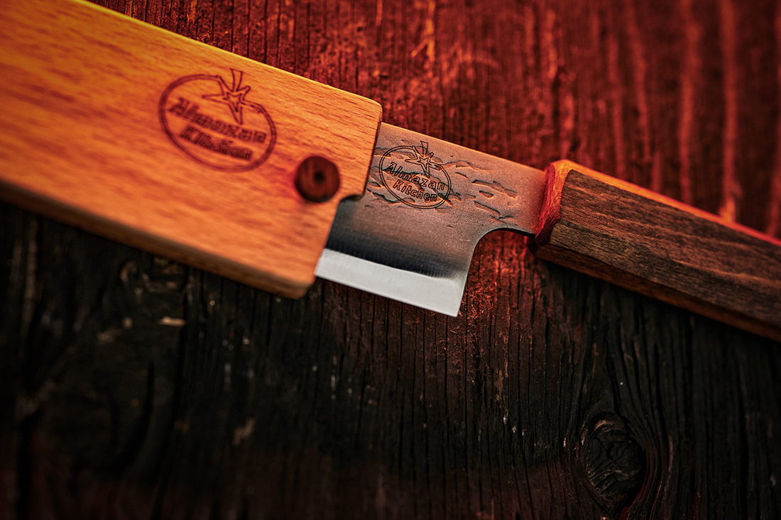 Close-up of the hammered blade and walnut handle